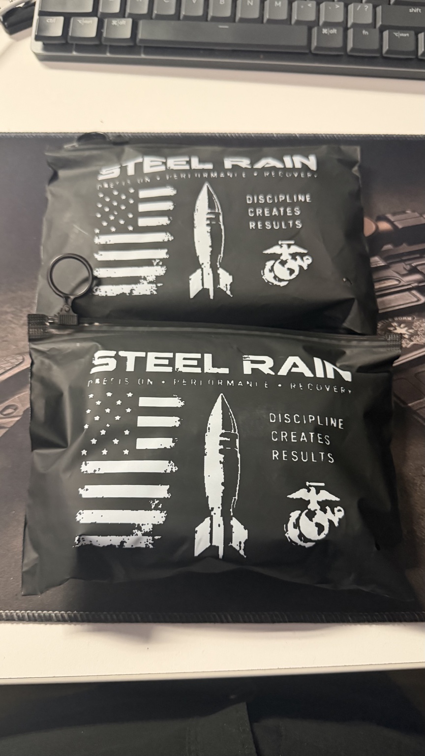 Original Steel Rain black packaging with a distressed flag and the words Discipline Creates Results